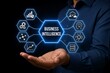 © Aitab - Hands holding glowing business intelligence concept with icons and data visualization