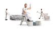© Ljupco Smokovski - Team of professional house painters preparing and renovating a room with protective covers
