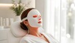 © ArtSync Studio - Woman Relaxing with an Led Light Therapy Mask for Facial Skin Rejuvenation in a Spa Treatment
