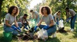 © Pete - Young volunteers work together planting trees and cleaning park grounds. Diverse group enjoys outdoor activity on sunny day. People help community, care for nature, build togetherness, work hard.