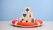© Ribas_ProductPro - Medical Icons on Wooden Blocks Inside Red Lifebuoy for Healthcare Safety and Insurance Concept
