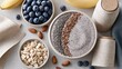 © InfiniteStudio - Elegant flat lay of a protein smoothie with chia seeds, flax seeds, oats, almonds, blueberries, and banana on a neutral backdrop Generative AI
