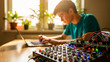 © ANDERSSON OLOF KARL - Young man working on electronic synthesizer and digital tablet at a desk. Focused technician connecting patch cables in a bright studio. STEM education and sound design marketing concept.