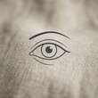© Patria - Minimalist line drawing of a human eye on a textured background.