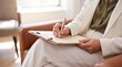 © Aurora Aesthetics - therapist clipboard notes counseling consultation psychologist mentalhealth treatment assessment office Close view of a clinician documenting a private session for records and healthcare promotion