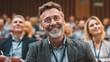 © sup - Smiling man in business meeting portrait
