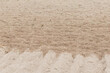 © Татьяна Зернова - A barren field with dry, cracked soil. The ground shows distinct lines from plowing, indicating agricultural activity. No vegetation is visible.