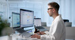 © Andrey Popov - Man Reviews Patient Medical Claims On Laptop