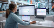 © Andrey Popov - Woman Reviews Transaction Logs On Laptop To Ensure Compliance