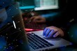 © Rawpixel.com - Hands typing on a laptop with digital network graphics overlay.