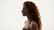 © mamo studios - Portrait of stunning young Caucasian woman with voluminous curly red hair and natural freckles for luxury beauty brand