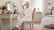 © zuchero - Older woman applying makeup