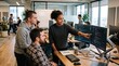 © Felippe Lopes - Diverse team of programmers collaborating on code in a modern office environment
