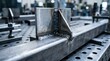 © Stock Spectrum - Industrial welder creating a welding seam onto steel metal in a factory setting.