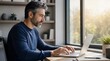 © PrabuanaAndika - Mature man working on laptop in home office
