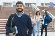 © Serhii - Indian student smiling on university campus