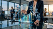 © Tenong - Business woman interacting with futuristic financial data interface