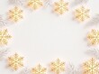 © kaneez - Golden snowflake Christmas frame on white background, elegant winter holiday border with pine branches, festive seasonal greeting card template