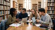 © Николай Срибяник - Diverse university students collaborating on academic project with laptops in library study group