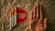 © 69 - Hand gesture signaling stop to smoking with broken cigarette over red stop sign on crumpled brown paper background for anti tobacco campaign and health awareness