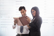 © IndiaPix - Business people reading document in office