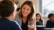 © Air H - Female teacher encouraging elementary school student during one on one classroom conversation with supportive guidance, positive communication, inclusive education, student confidence and academic