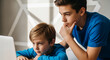© Mirivox - Two boys in blue shirts focused on a laptop, representing education, learning, or shared digital experience, with a bright, modern background.