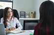 © STOCKEROcr - Businesswoman conducting job interview, discussing recruitment with candidate