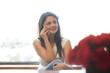 © IndiaPix - Smiling woman talking on mobile phone