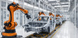 © Abu - Automated car production line with robotic arms assembling vehicle chassis in modern high tech factory robotics automation manufacturing automotive assembly industrial technology