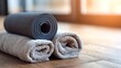 © TAO - Yoga mats towels side by side morning light