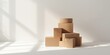 © AImmersive Imagery - Stacked Cardboard Boxes in Soft Natural Light on a Bright Background