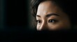 © Himagina - Close-up portrait of an Asian woman looking away with serious expression