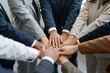 © Wei - People stack their hands together to mark the start of a new cooperation. It is such a common team-building activity. Business, teamwork, success, celebration,