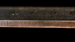 © Mrs. Studio - Extreme Macro View of a Metallic Coin Edge.