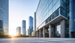 © MDMizan - Modern glass skyscraper facade and urban office district at sunset with skyscraper building architecture corporate business exterior commercial construction reflective development