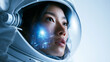 © BlackBridge Media - Female Astronaut in Spacesuit Helmet Looking into Future