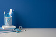 © ActionGP - Side view photo of blue stationery and school supplies on a clean desk for back to school study