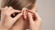 © sabrang - Professional Fitting of Modern Hearing Aid for Improved Auditory Health