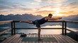 © Salman - Woman practicing yoga warrior pose on wooden deck at sunrise overlooking calm lake and mountains, representing balance wellness and mindfulness..
