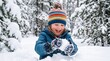 © rehfstudio - Children playing in snow holding a snowball in the winter woods