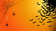© NUR - Halloween themed orange gradient with black spiderwebs and bats