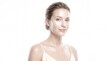 © Mateen - Radiant woman with glowing skin and natural makeup, beautiful female model in skincare concept, healthy complexion portrait on white background