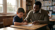 © Nina - Teacher assisting young student with writing at school desk.