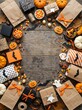 © RAIHANUL - Halloween celebration party favors and candy on rustic wooden background with halloween pumpkins seasonal celebration background decorations presents overhead chocolate tradition packaging