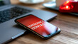 © Nataliya - Close-up of smartphone displaying emergency contact with urgent red background, defocused background, with copy space