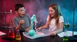 © Kateryna - Education: Children react with delight as a foaming chemistry experiment erupts in school laboratory