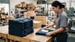 © edivaldo - Warehouse worker labeling a stack of blue fabric bags for shipping