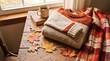 © warizshake - Folded knitted sweaters and coffee on a rustic wooden table
