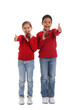 © Pixel-Shot - Little students with apples showing thumb-up on white background